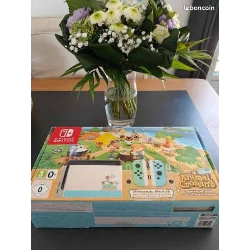 Console nintendo switch animal crossing + code de téléchargement du jeu inclus