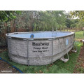 Kit piscine tubulaire ovale Bestway Power Steel SwimVista avec hublots 4,88 x 3,05 x 1,07 m + 10 kg de zéolite + Pompe à chaleur - vue 1