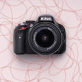 Nikon D5100 - Appareil photo numérique - Reflex - 16.2 MP - APS-C - 1080p - 3x zoom optique objectif AF-S VR DX 18-55 mm - vue 2